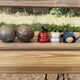 Comment ramasser ses boules de pétanque sans se baisser ? Le guide complet